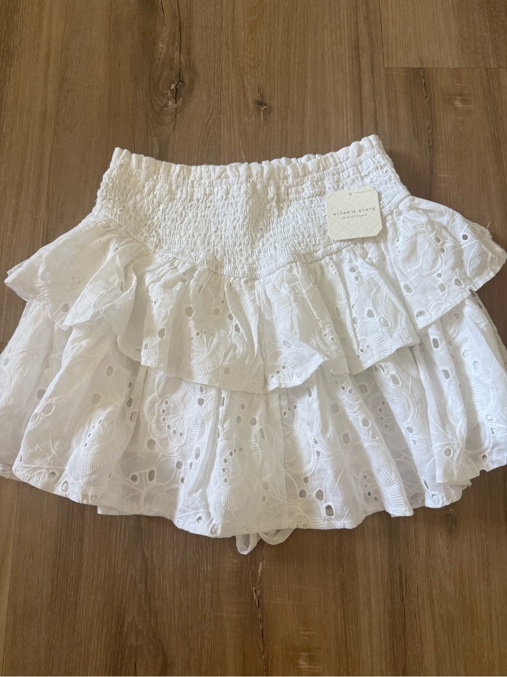 Adorable ruffle white skirt from Altered State